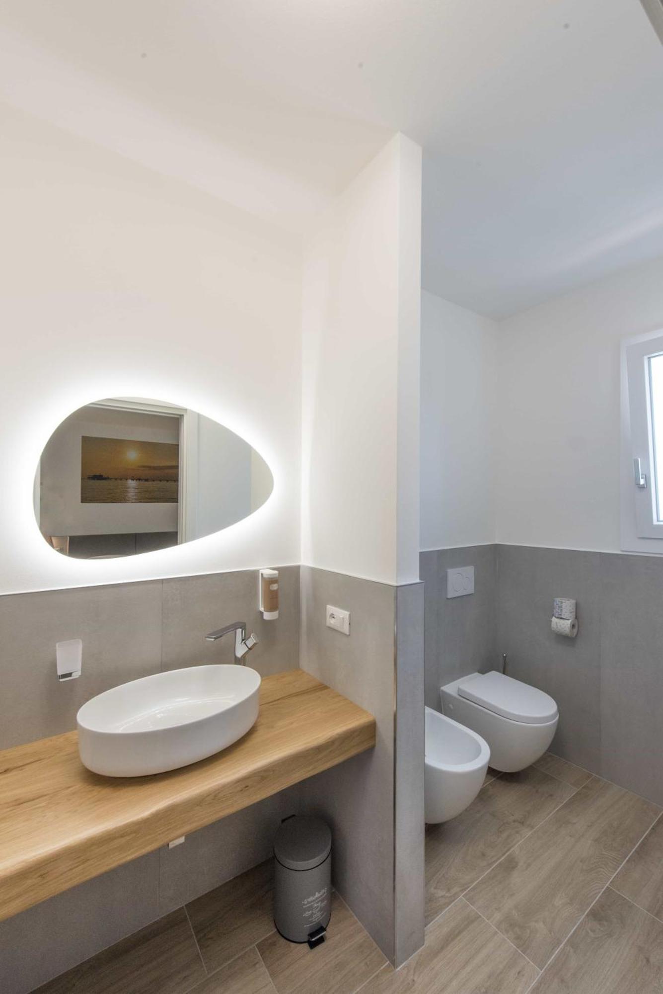 Guesthouse Stadio Lignano Sabbiadoro Bagian luar foto