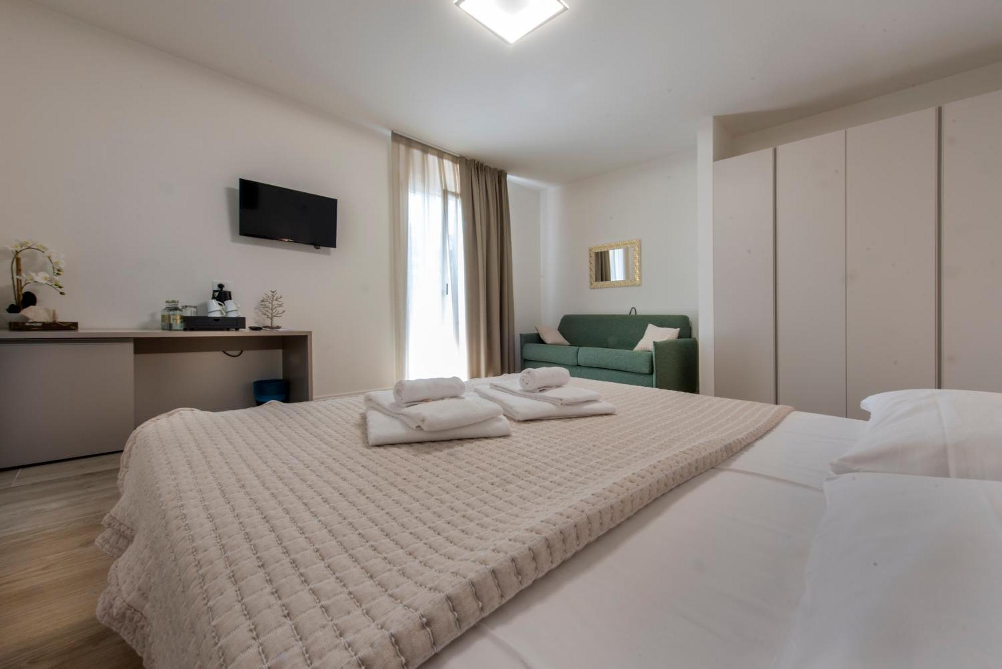 Guesthouse Stadio Lignano Sabbiadoro Bagian luar foto