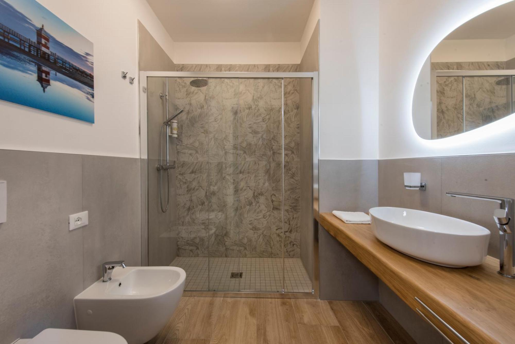 Guesthouse Stadio Lignano Sabbiadoro Bagian luar foto
