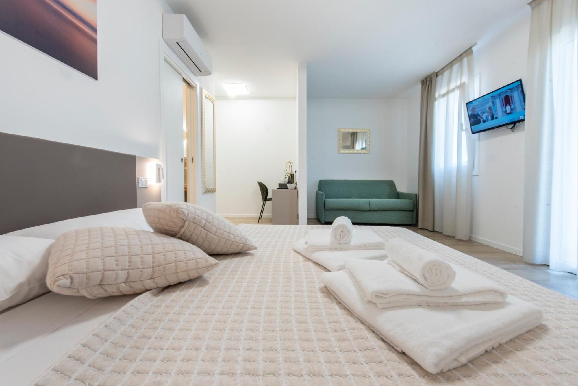Guesthouse Stadio Lignano Sabbiadoro Bagian luar foto