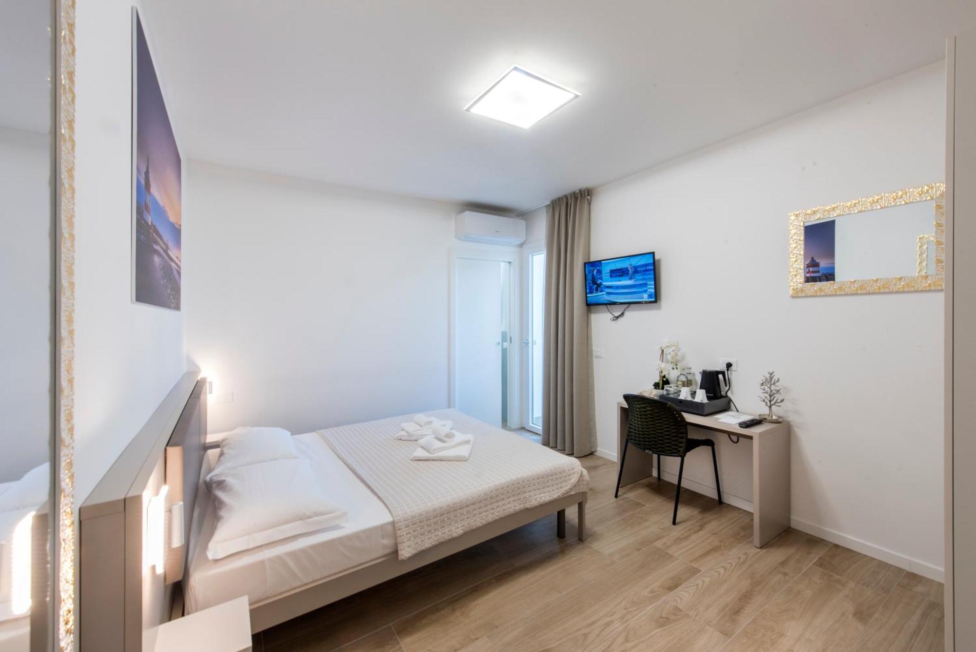 Guesthouse Stadio Lignano Sabbiadoro Bagian luar foto