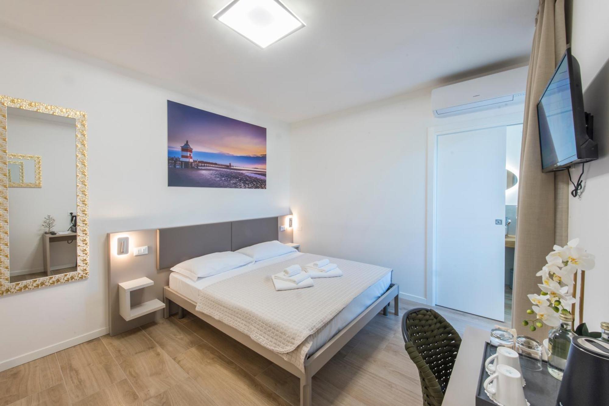 Guesthouse Stadio Lignano Sabbiadoro Bagian luar foto