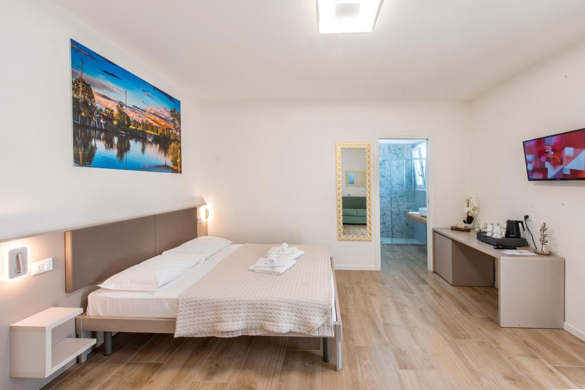Guesthouse Stadio Lignano Sabbiadoro Bagian luar foto