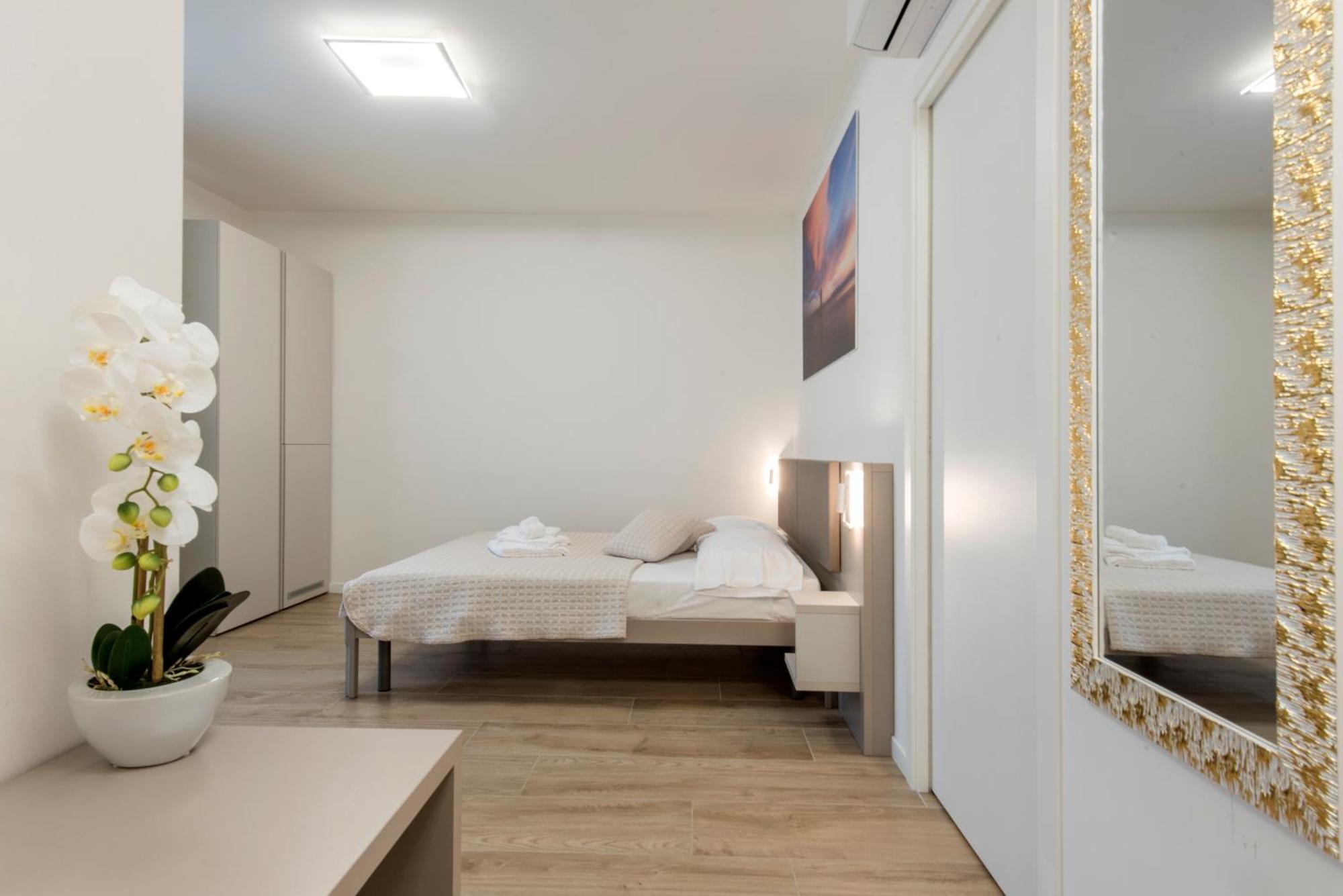Guesthouse Stadio Lignano Sabbiadoro Bagian luar foto