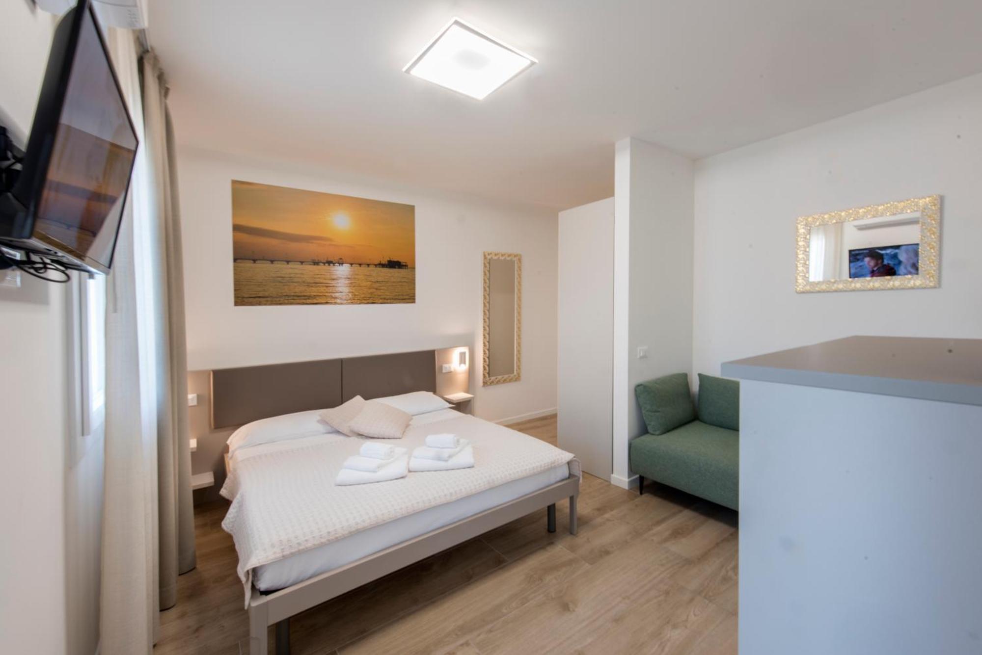 Guesthouse Stadio Lignano Sabbiadoro Bagian luar foto