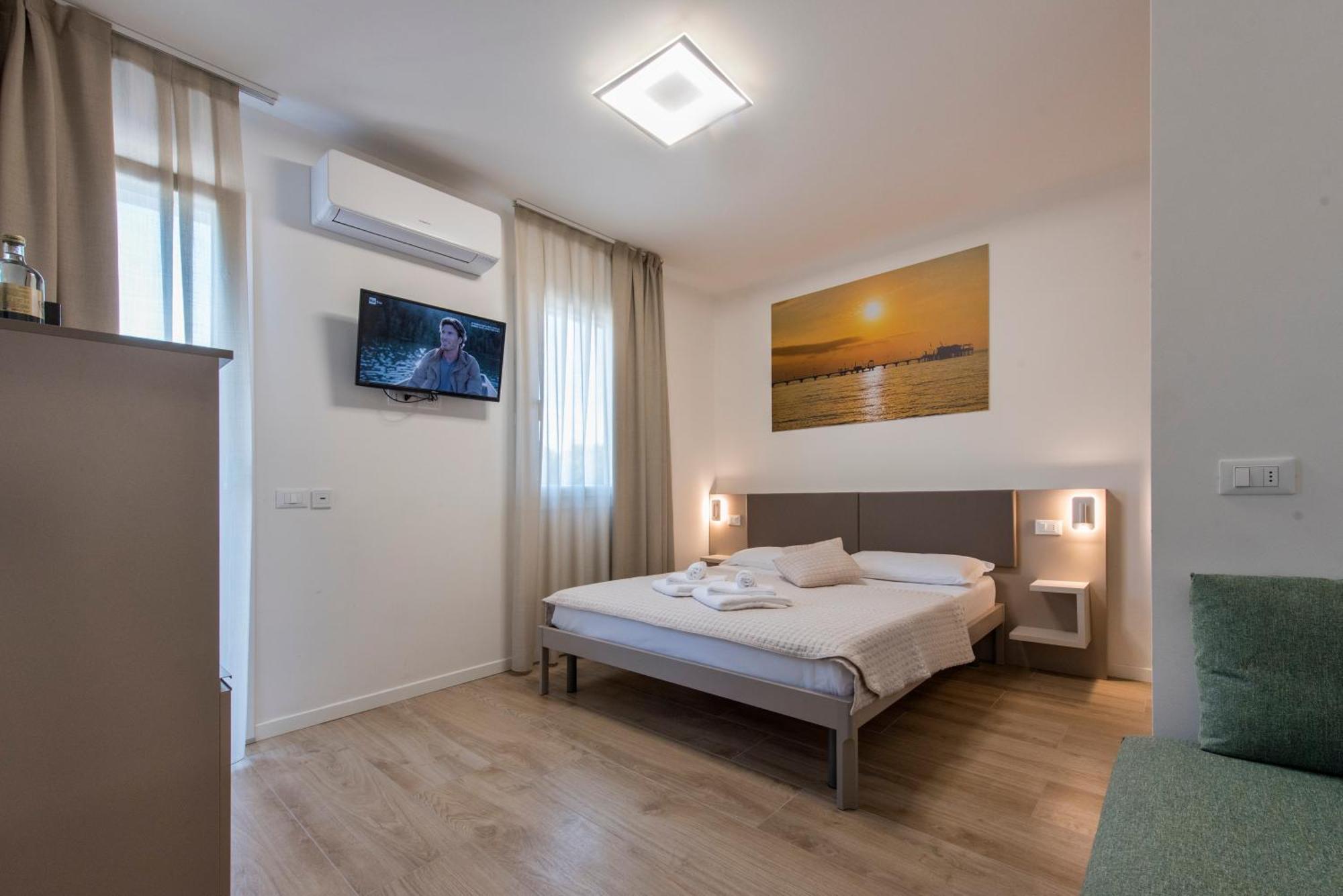 Guesthouse Stadio Lignano Sabbiadoro Bagian luar foto
